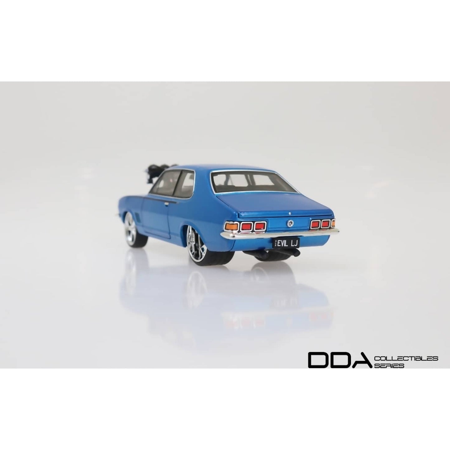 DDA Collectibles -  1:24 Scale - Metallic Blue Evil LJ 1973 Holden LJ Torana - Diecast Model