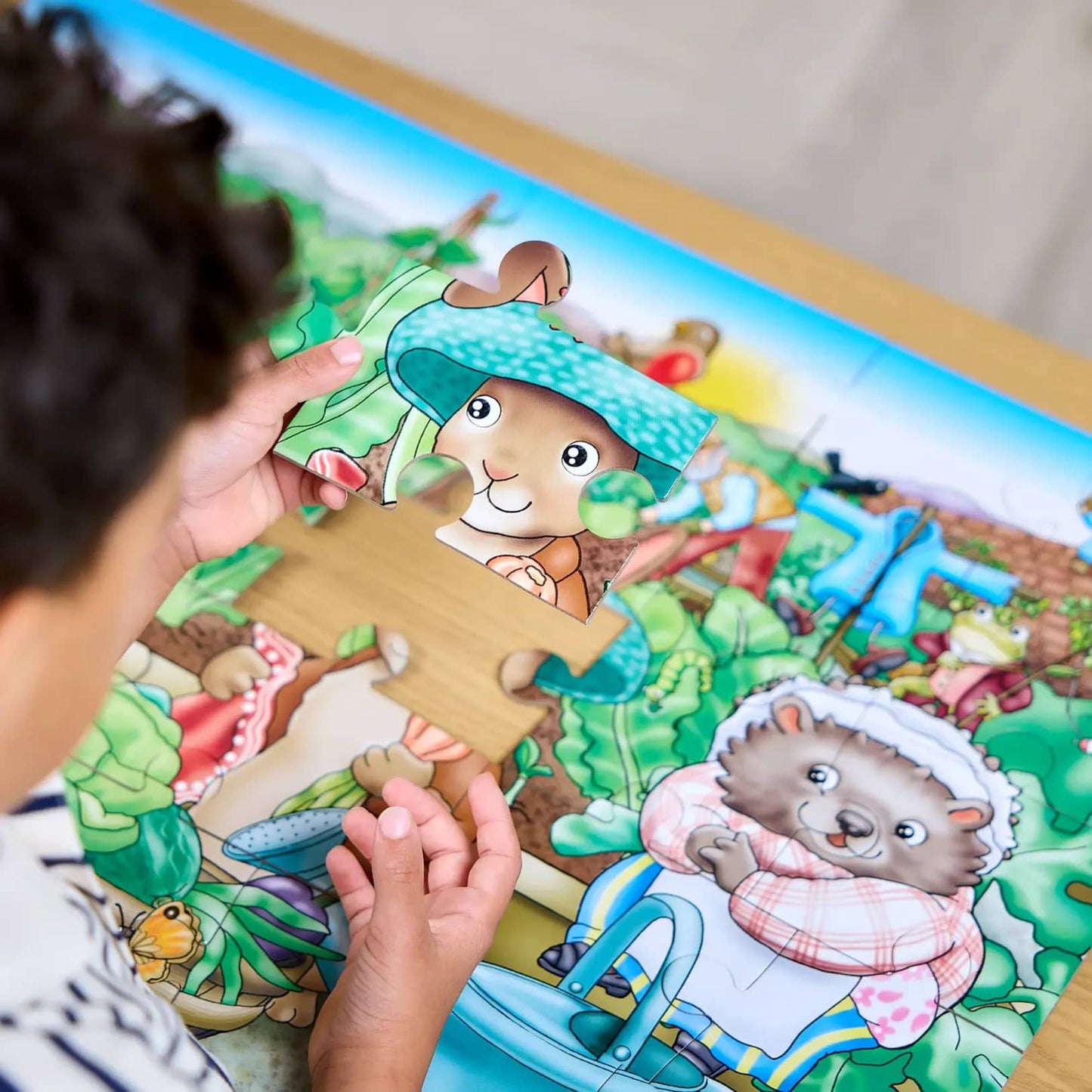 Orchard Toys - Peter Rabbit™ In Mr. McGregor's Garden jigsaw puzzle 25 Pieces