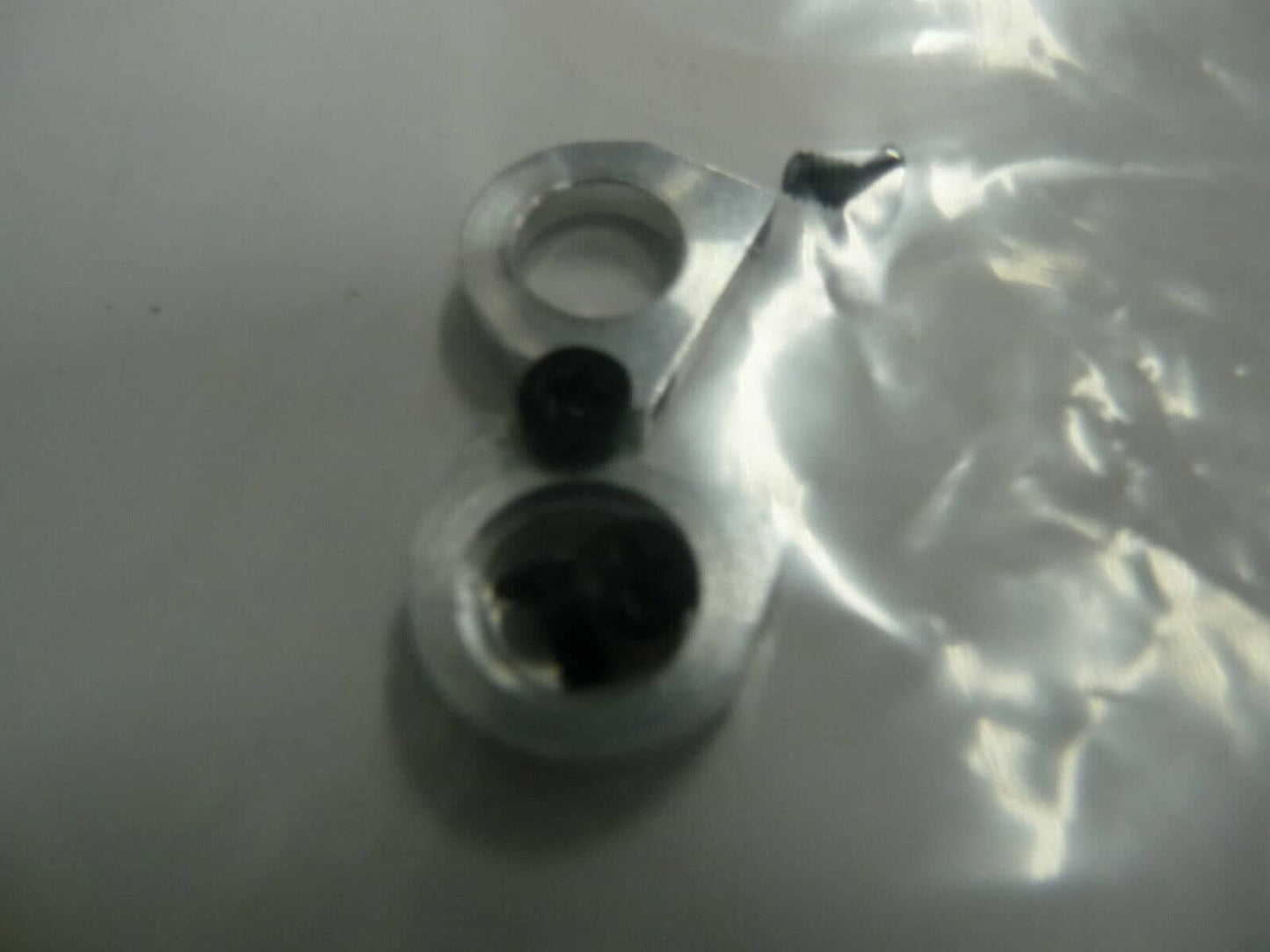 BRM -  SLOT RS-205 RevoSlot Front Axle Holders + Screws