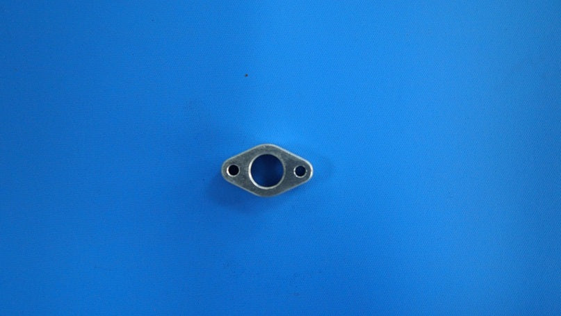 NGH -  PART EXHAUST MANIFOLD ADAPTER F60i2 NHF60414