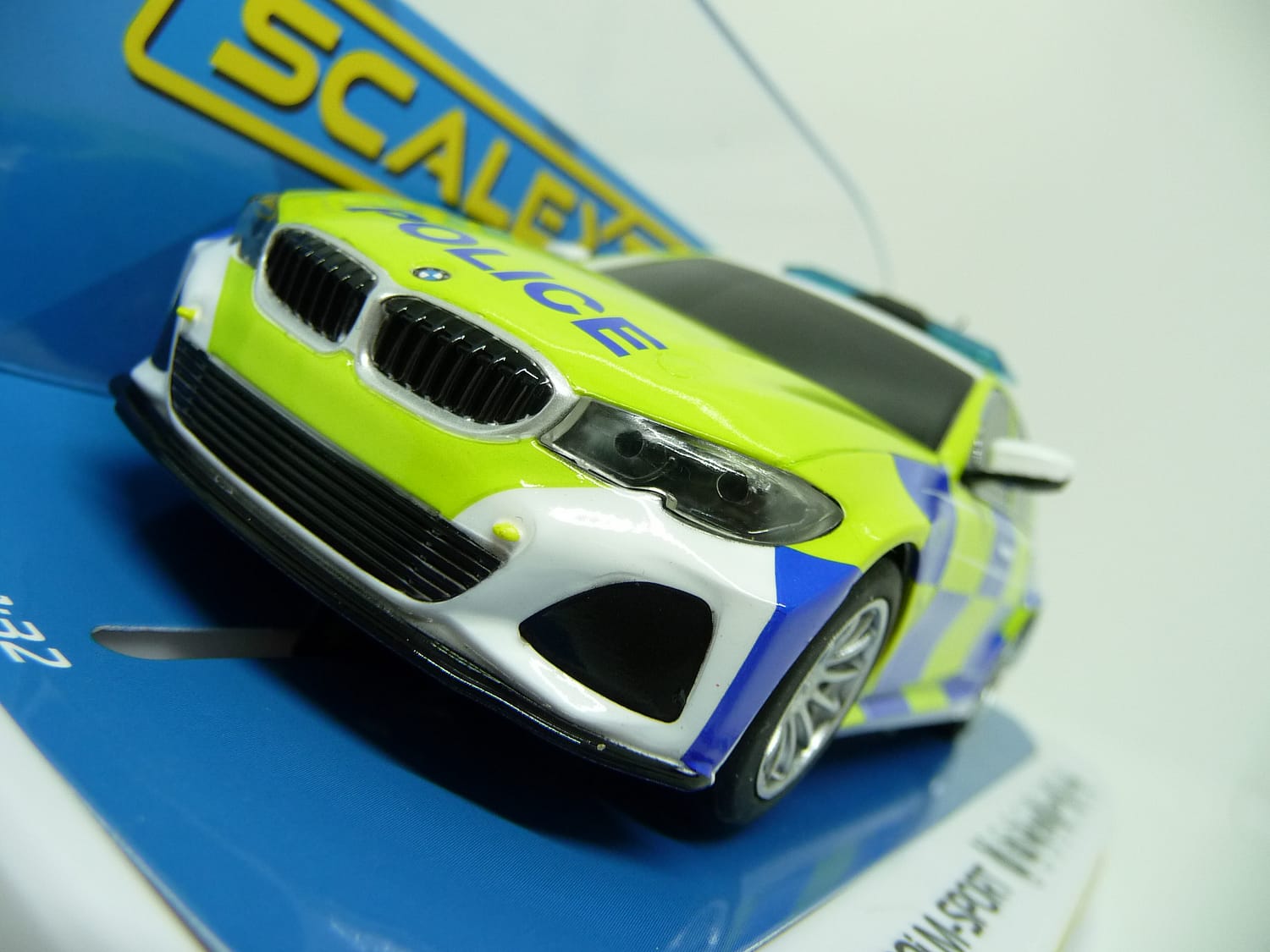Scalextric C4165 BMW 330i M Sport Police Edition slot car also suits Carrera
